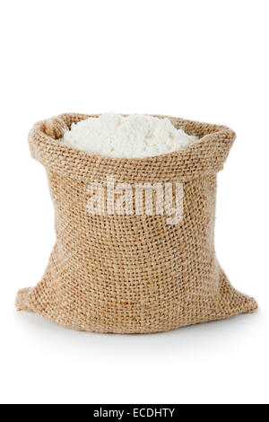 Wheat flour in small burlap sack Stock Photo