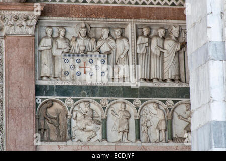Bas relief on the Cathedral of St Martin wall, Lucca, Tuscany, Italy Stock Photo