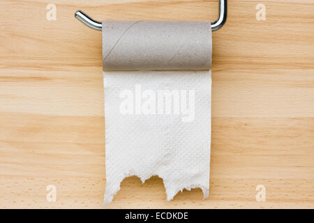 Toilet paper on wooden background. Empty space for text Stock Photo