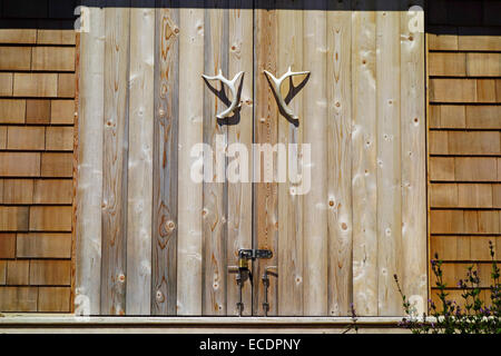 deer antlers on door Stock Photo