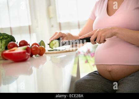 Close-up Salad preparing healthy pregnant woman Stock Photo