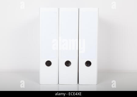 folders in white color on desk Stock Photo