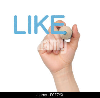 Woman hand writing with blue pencil word like on white background Stock Photo