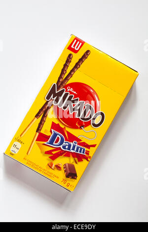 Box of unopened Lu Glico Mikado Daim biscuits isolated on white background - Mikado sticks Stock Photo