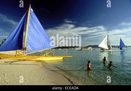 Boats to practice sailing. White beach. Boracay. Philippines. Boracay is a small island in the Philippines located approximately Stock Photo