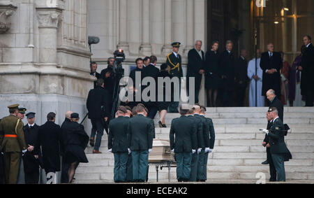 Brussels, Belgium. 12th Dec, 2014. Soldiers surround the coffin of Belgium's Queen Fabiola into the Church of Our lady for the funeral service in Laeken, Brussels, capital of Belgium, Dec. 12, 2014. Belgium's Queen Fabiola, widow of King Baudouin and queen between 1960 and 1993, died at the age of 86 on Dec. 5. Credit:  Zhou Lei/Xinhua/Alamy Live News Stock Photo