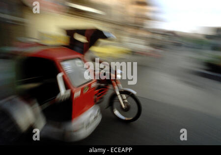 Trycicle. Mototaxis. Ilocos. Vigan. Philippines. Next to jeepney, tricycle or 'traysikel' in Tagalog is another popular form of Stock Photo