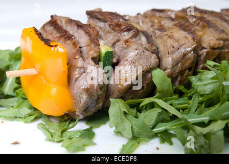 shashlik with potherbs on the plate Stock Photo