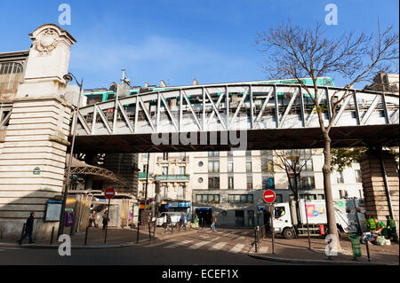 Boulevard de la Chapelle, Paris - Metro train at Barbès-Rochechouart station on an elevated section of Line 2 Stock Photo