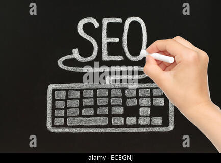Hand drawing chalk SEO concept with keyboard Stock Photo