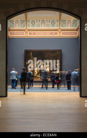 Visitors looking at Rembrandt's The Night Watch in the Rijksmuseum, Amsterdam, the Netherlands Stock Photo
