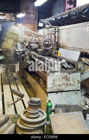 old lathe machine in turning work shop Stock Photo