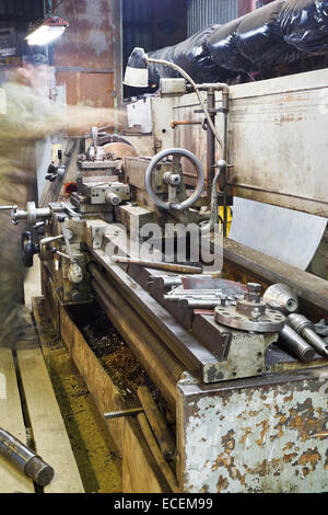 old metalworking lathe machine in turning workshop Stock Photo