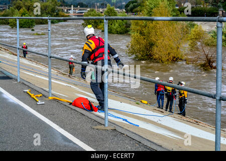 Los Angeles, California, USA. 12th December, 2014. Firefighters doing swift water rescue of two persons trapped in the Los Angeles River after large rain storm in Southern California Credit:  Chester Brown/Alamy Live News Stock Photo