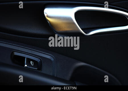 Detail of a car's door pictured from inside the vehicle Stock Photo