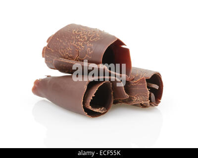 three peeled chocolate curls, isolated on white background Stock Photo