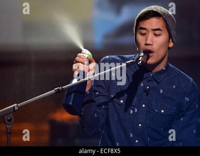 Huerth, Germany. 07th Dec, 2014. The musician Andrew Huang performs during the RTL live TV show '2014! Menschen, Bilder, Emotionen' in Huerth, Germany, 07 December 2014. Photo: Henning Kaiser/dpa/Alamy Live News