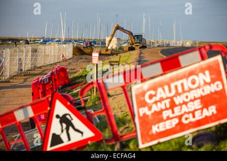 Restoring the coastal defences after they were damaged by the extreme ...