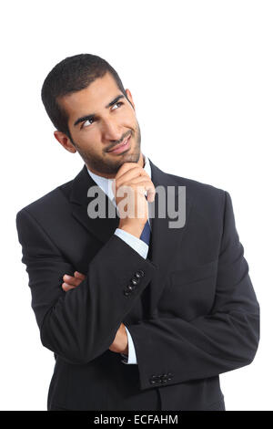 Arab business man thinking smiling looking sideways isolated on a white background Stock Photo