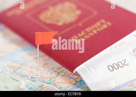 passport with money lies on the tourist map Stock Photo