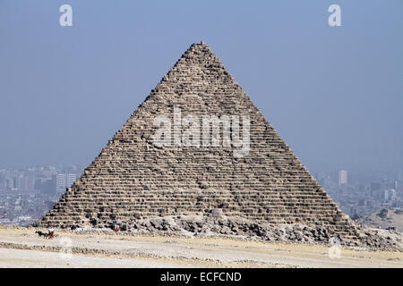The pyramid of Menkaure, with the smog of Cairo in the background, Egypt on Friday 12 November 2010 Stock Photo