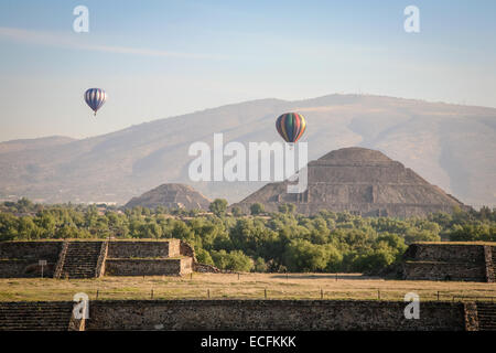 Two Balloons flying over the Teotihuacan in front of the Pyramid of the Sun and Pyramid of the Moon Stock Photo