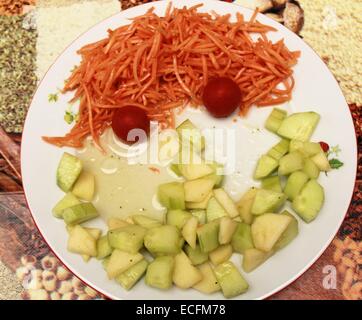 Funny face man made of cucumbers ,pears, tomatoes and carrots Stock Photo