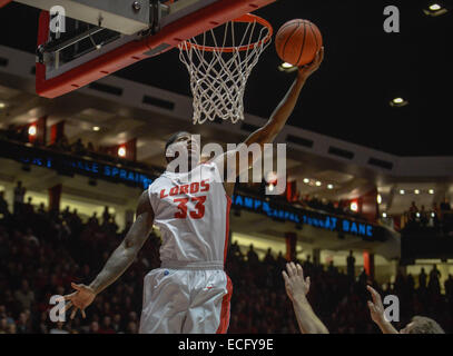 Albuquerque, New Mexico, USA. 13th Dec, 2014. Roberto E. Rosales.Lobo Deshawn Delaney(Cq) extends for any easy under the basket shot Saturday evening against UL Monroe. Lobos defeated ULM 54 TO 46. © Roberto E. Rosales/Albuquerque Journal/ZUMA Wire/Alamy Live News Stock Photo