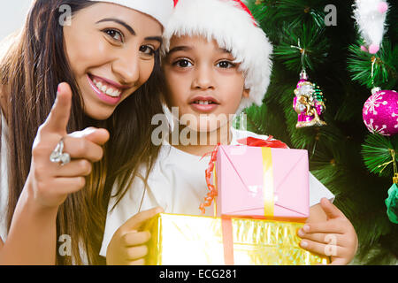 indian mother with  child Christmas Festival  gift Stock Photo
