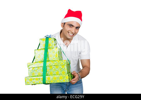 indian man Christmas Festival Showing gift Stock Photo