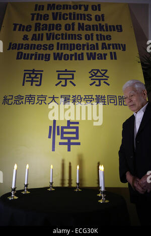 San Francisco, USA. 13th Dec, 2014. Qiu Weifeng, a survivor of the violence by the Japanese invaders, mourns during a memorial for the victims of Nanjing Massacre in San Francisco, the United States, Dec. 13, 2014. Invading Japanese troops captured Nanjing on Dec. 13, 1937, and started a 40-odd-day slaughter. More than 300,000 Chinese civilians and unarmed soldiers were murdered and about 20,000 women were raped. © Liu Yilin/Xinhua/Alamy Live News Stock Photo