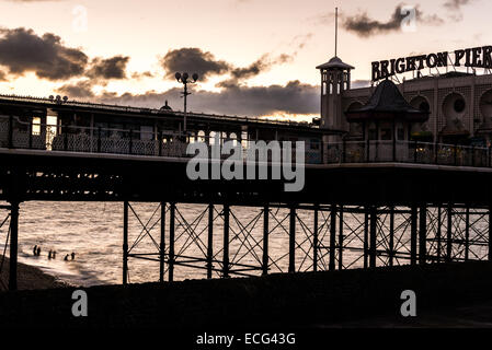 Brighton, UK. 14th Dec, 2014. Swimmers at dawn on a frosty December morning by Brighton Pier. Credit:  Julia Claxton/Alamy Live News Stock Photo