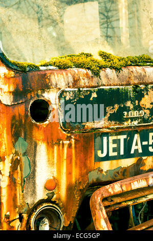 Front end of a rusty old jet fuel truck Stock Photo