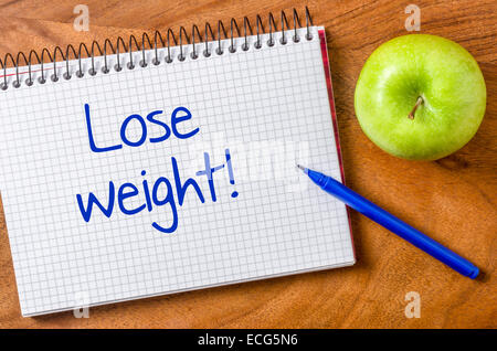 Lose weight written on a notepad Stock Photo