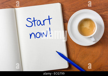 Notebook on a desk - Start now Stock Photo