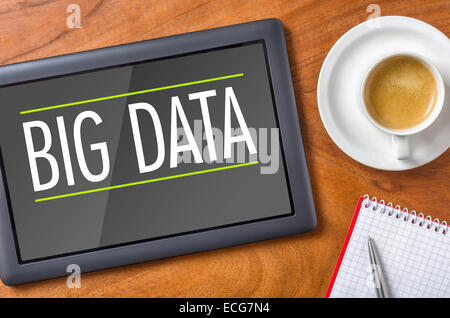 Tablet on a desk - Big Data Stock Photo