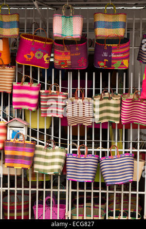 Mauritius, Mahebourg, town centre, colourful hand woven bags displayed Stock Photo