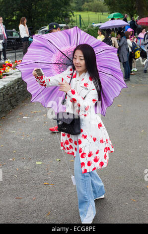 Chinese young female tourists taking selfies Stock Photo - Alamy