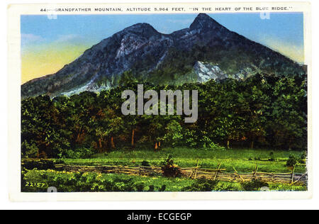 This 1930s postcard shows Grandfather Mountain, with an altitude of 5,964 feet, in the heart of the Blue Ridge Mountains in North Carolina State Park. It is the highest peak on the eastern escarpment of the Blue Ridge Mountains, a major chain of the Appalachian Mountains. Stock Photo