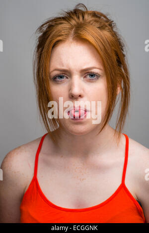 A ginger haired freckled skinned 16 17 18 year old slim caucasian