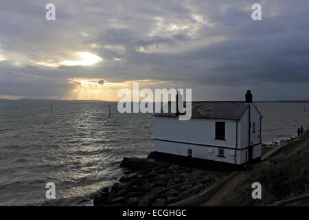 Solent, Hampshire, UK. 14th Dec, 2014. Lepe on the Solent, Hampshire, UK. The Watch House on the coast at Lepe looks out over the stormy waters of the Solent churned up by the strong winds blowing along the south coast of England today. Credit:  Julia Gavin UK/Alamy Live News Stock Photo