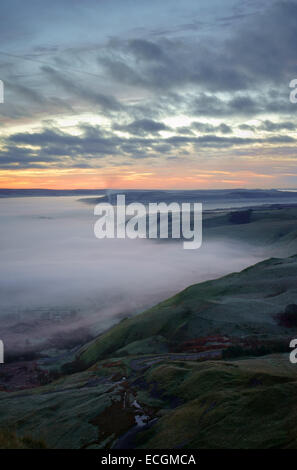 UK,Derbyshire,Peak District,Sunrise over Misty Hope Valley from Mam Tor Stock Photo