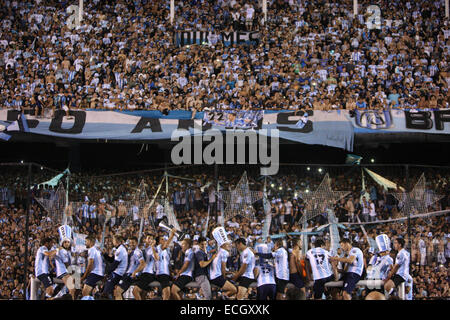 Avellaneda, Argentina. 14th Dec, 2014. Players of Racing Club celebrate at the end of the Final match against Godoy Cruz of Argentinean Soccer First Division at Presidente Peron Stadium, in Avellaneda City, 20km from Buenos Aires City, Argentina, on Dec. 14, 2014. © Martin Zabala/Xinhua/Alamy Live News Stock Photo