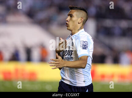 Avellaneda, Argentina. 14th Dec, 2014. Adrian Centurion of Racing Club celebrates his goal during the Final match against Godoy Cruz of Argentinean Soccer First Division at Presidente Peron Stadium, in Avellaneda City, 20km from Buenos Aires City, Argentina, on Dec. 14, 2014. © Martin Zabala/Xinhua/Alamy Live News Stock Photo