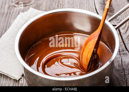 liquid caramel in a saucepan Stock Photo