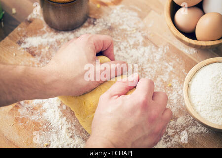 the hands on the dough Stock Photo