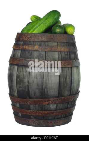 old wooden barrel with cucumbers  on white background Stock Photo