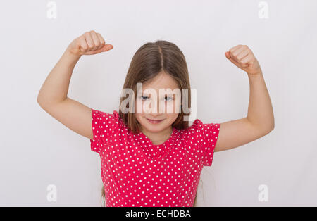 Girl with strong arms Stock Photo