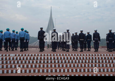 Dhaka, Bangladesh. 15th Dec, 2014. Special forces preparing themselves  in front of National Martyrs' Memorial where thousands of people will gather on the Victory Day to pay homage to the Liberation War martyrs. Jatiyo Sriti Shoudho or National Martyrs' Memorial is the national monument of Bangladesh is the symbol in the memory of the valour and the sacrifice of all those who gave their lives in the Bangladesh Liberation War of 1971, which brought independence and separated Bangladesh from Pakistan. The monument is located in Savar, about 35 km north-west of the capital, Dhaka. © zakir hossai Stock Photo