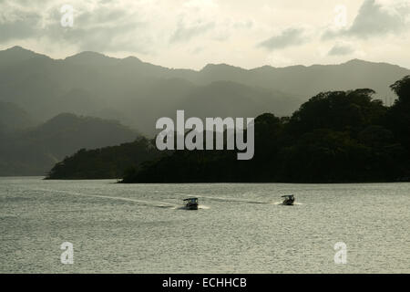 Boats on the lake near the Arenal Volcano in Costa Rica. Stock Photo